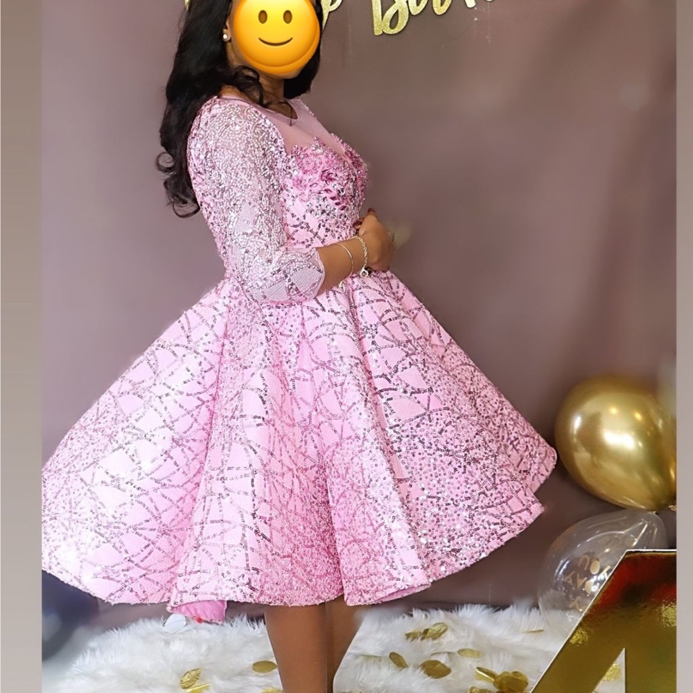 Handmade dress. Well beaded with stones. The bottom part is full and heavy